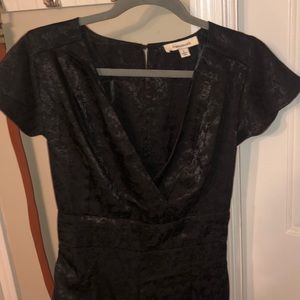 black lowcut jumpsuit